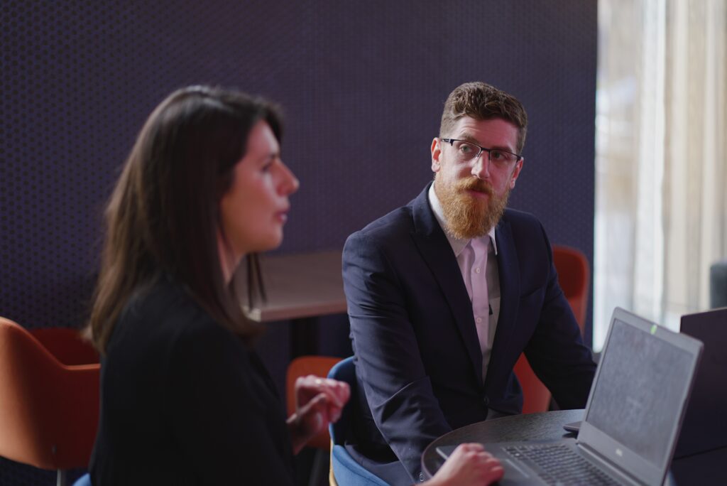 Equilibrium Security team engaged in focused conversation